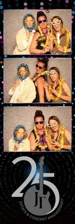 Three friends in tropical leis on a photo strip at the Jackson-Triggs Summer Concert Series
